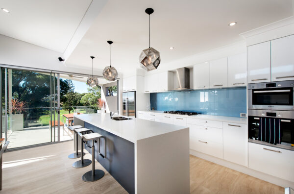 Custom Home Kitchen with blue splashback