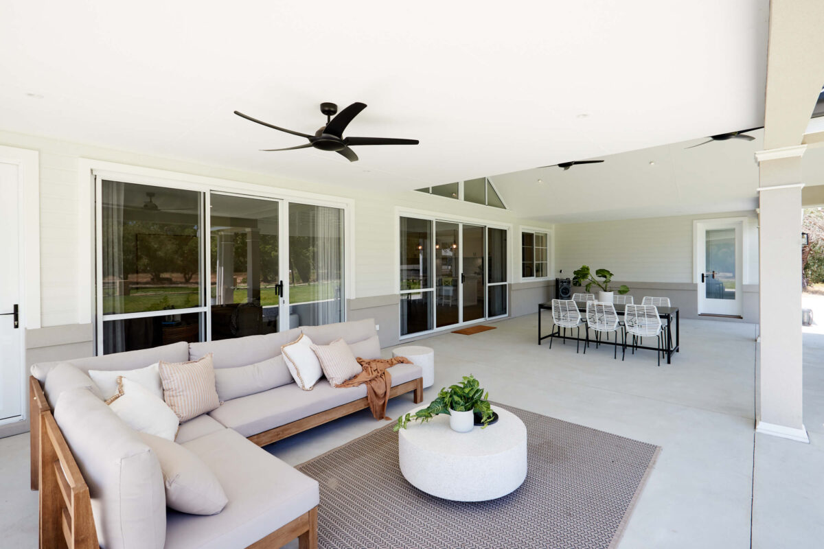 The expansive alfresco benefits from ceiling fans and lots of sliding doors to ensure a seamless indoor/outdoor connection. 