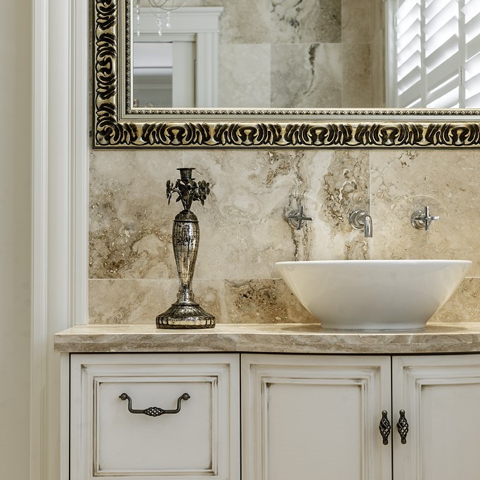 French Provincial design with an extravagant vanity in the master bathroom ensuite